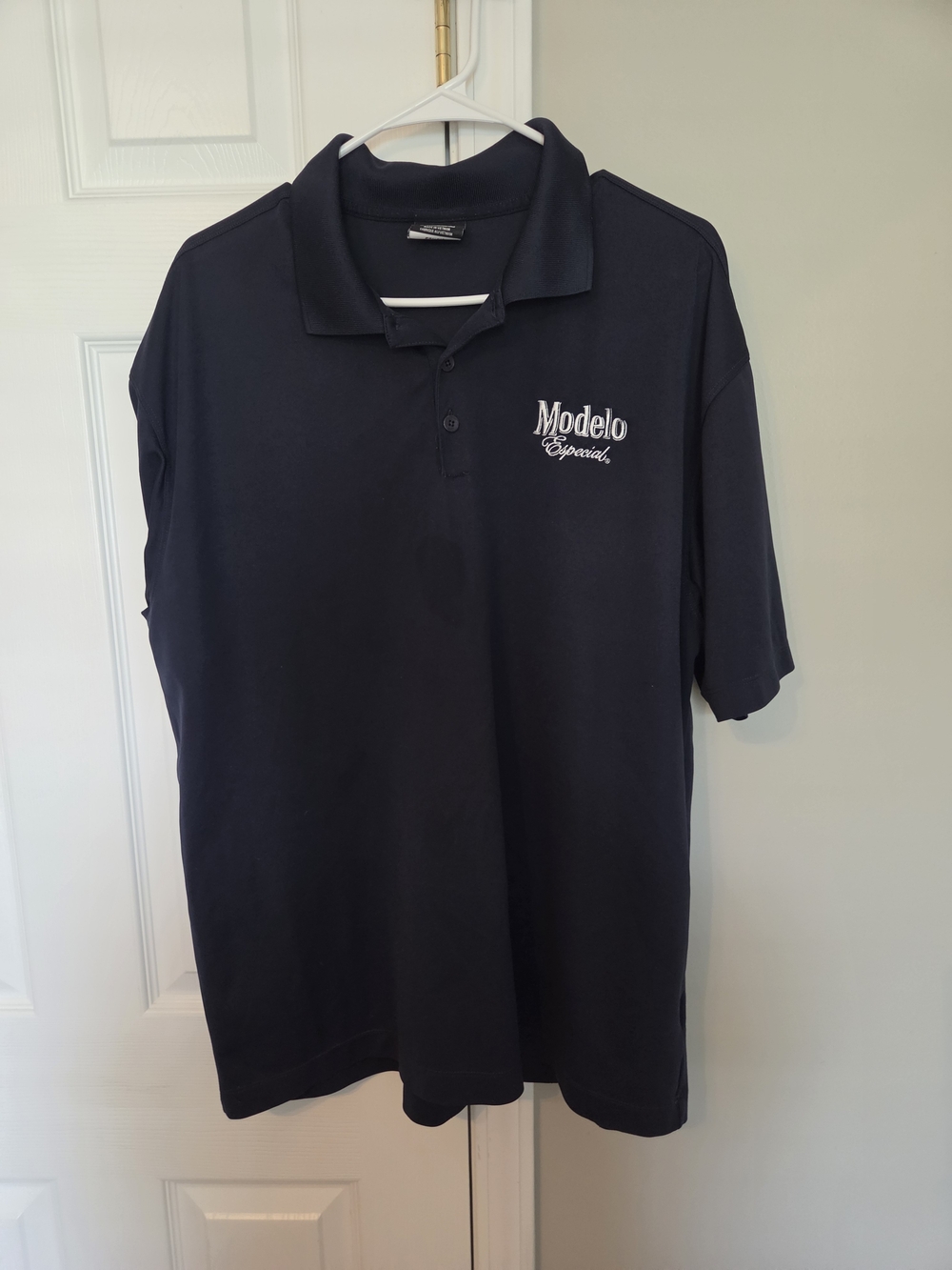 Nike Men's Dark Navy Polo with White Modelo Embroidery